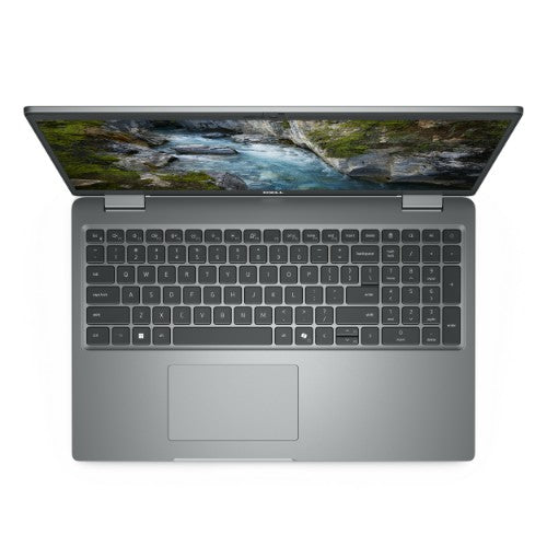 Gray Dell Precision 3591 laptop with full-sized keyboard and 15.6-inch display showing nature wallpaper.