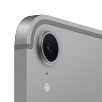 Close-up of grey Apple iPad mini 7th Gen rear corner showing single camera and flash.