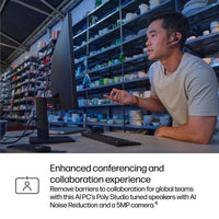 Silver HP ProBook 16-inch laptop open on desk with person wearing headset using it in workshop setting.