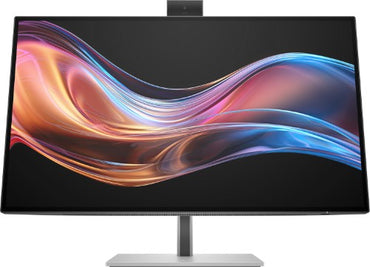 27-inch HP 4K monitor with slim bezels, sleek silver stand, and vibrant abstract wave display.